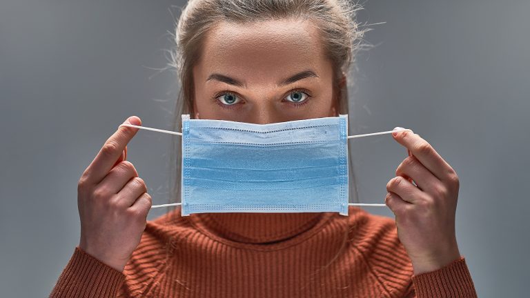 Healthy,Woman,Using,Medical,Protective,Mask,To,Health,Protection,And