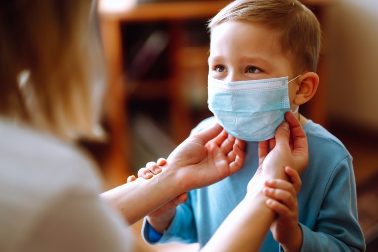 Little,Boy,And,Mom,In,Medical,Mask.,Mother,Puts,On