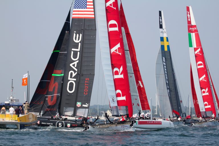 Catamarans,Line,Up,For,Start,Of,2012,America's,Cup,World