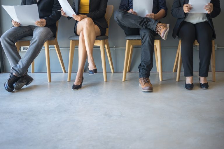 Group,Of,Peoples,Are,Sitting,To,Review,The,Documents,While