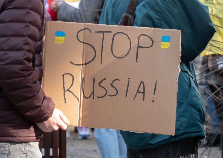 Krakow,,Poland,-,February,24,,2022:,Protesters,Holding,"stop,Russia"