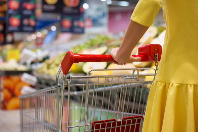 Woman,Shopping,For,Groceries,In,Supermarket