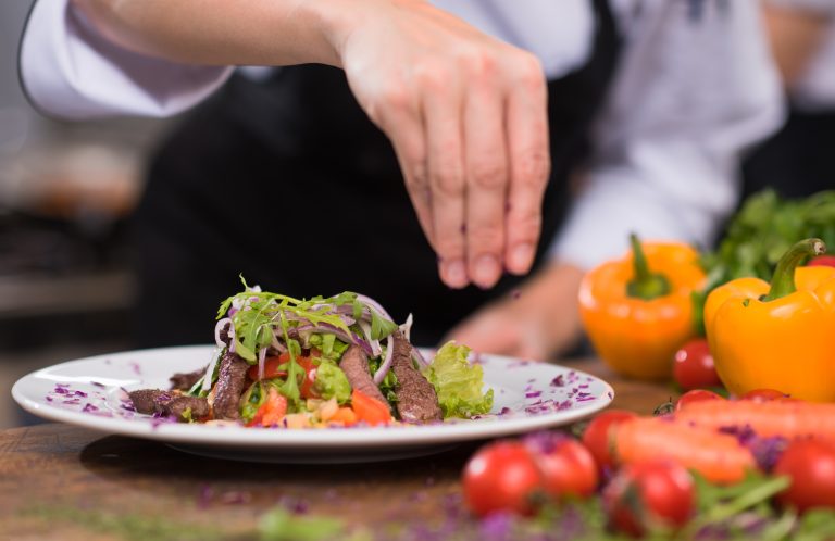 Cook,Chef,Decorating,Garnishing,Prepared,Meal,Dish,On,The,Plate
