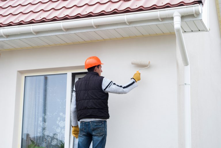 Construction,Worker,Is,Painting,A,Wall,With,A,Roller