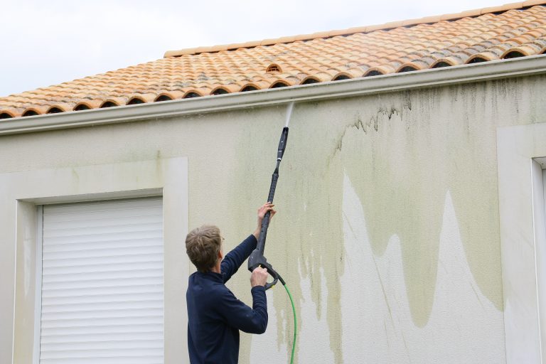Cleaning,House,With,A,High-pressure,Cleaner