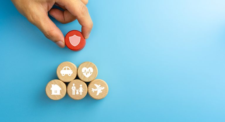 Insurance,Concept.,Wooden,Blocks,With,Insurance,Icons.,Family,,Life,,Car,