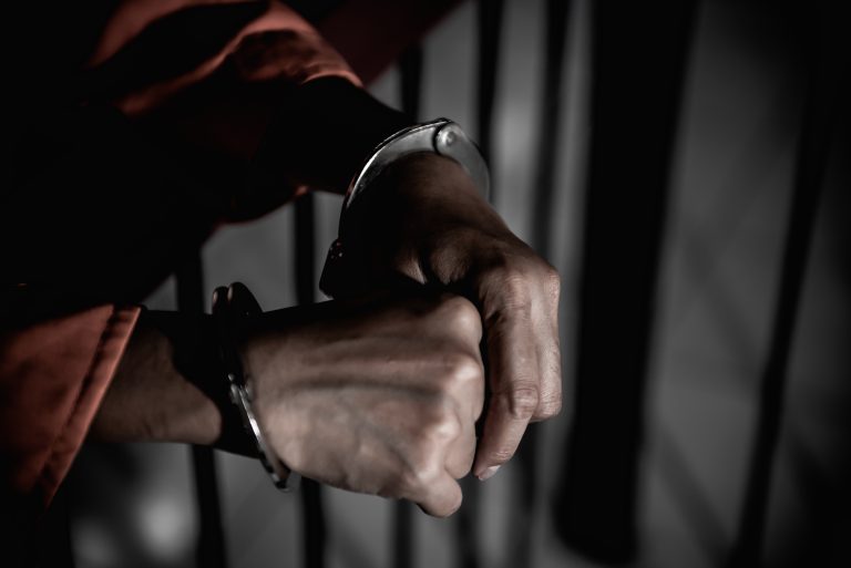 Hands,Of,Women,Desperate,To,Catch,The,Iron,Prison,prisoner,Concept,thailand