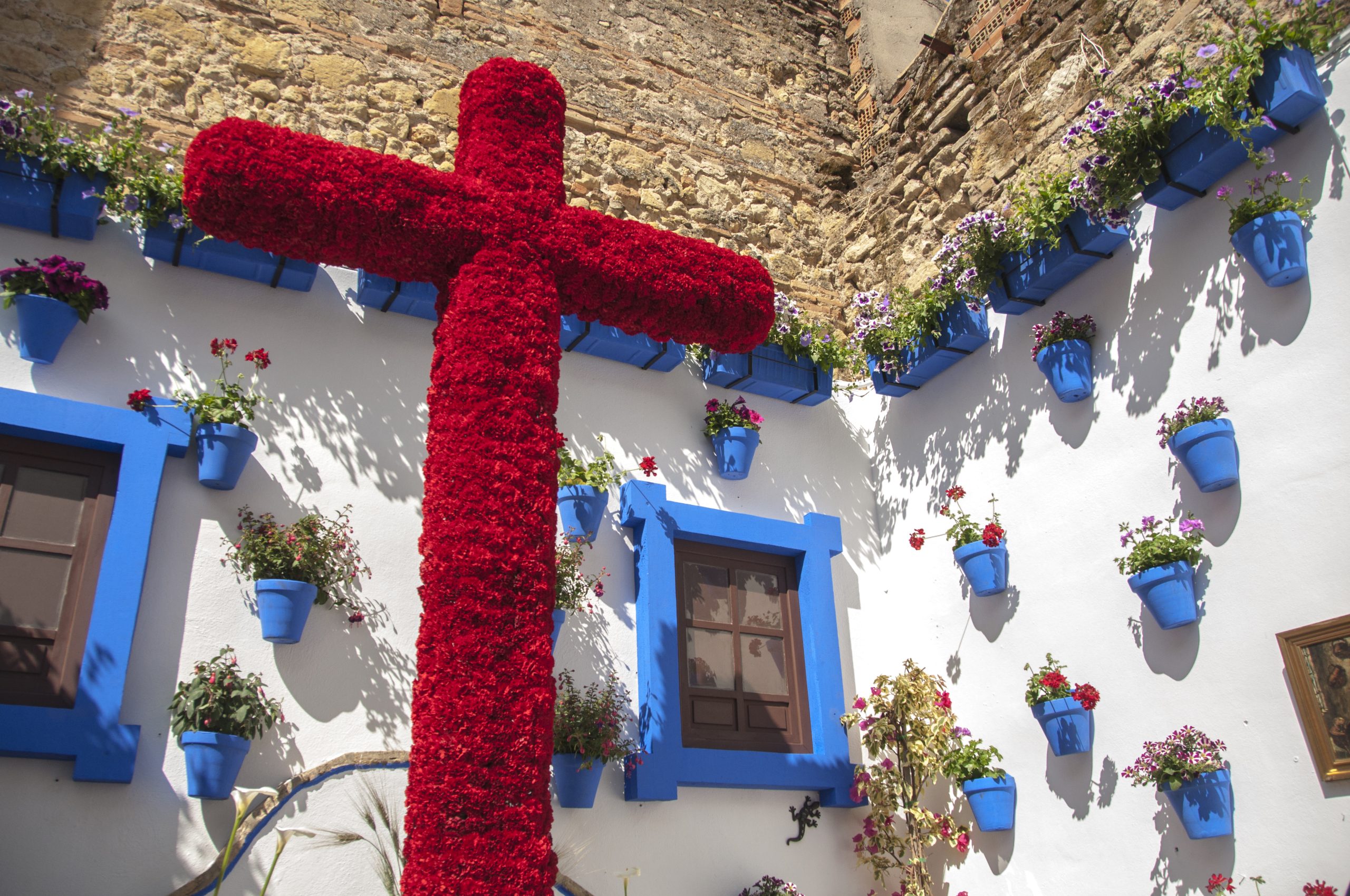 A,Beautiful,Red,Cross,Made,Of,Flowers,And,Plants,In