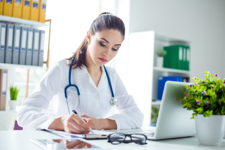 Photo,Of,Attractive,Concentrated,Female,Doctor,Writing,Prescription,On,Special