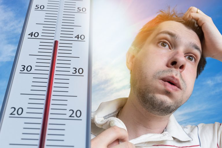 Hot,Weather,Concept.,Young,Man,Is,Sweating.,Thermometer,Is,Showing