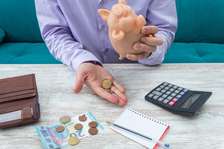 Young,Man,Removes,The,Last,Remaining,Coins,From,His,Pocket