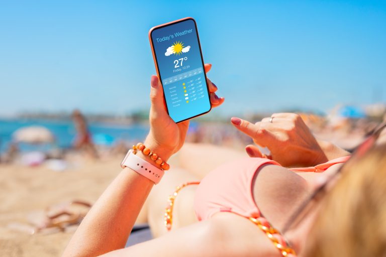 Woman,Sunbathing,On,The,Beach,In,Hot,Summer,Day,And
