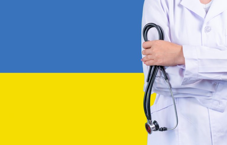 Female,Doctor,With,Stethoscope,In,Hand,On,The,Background,Of