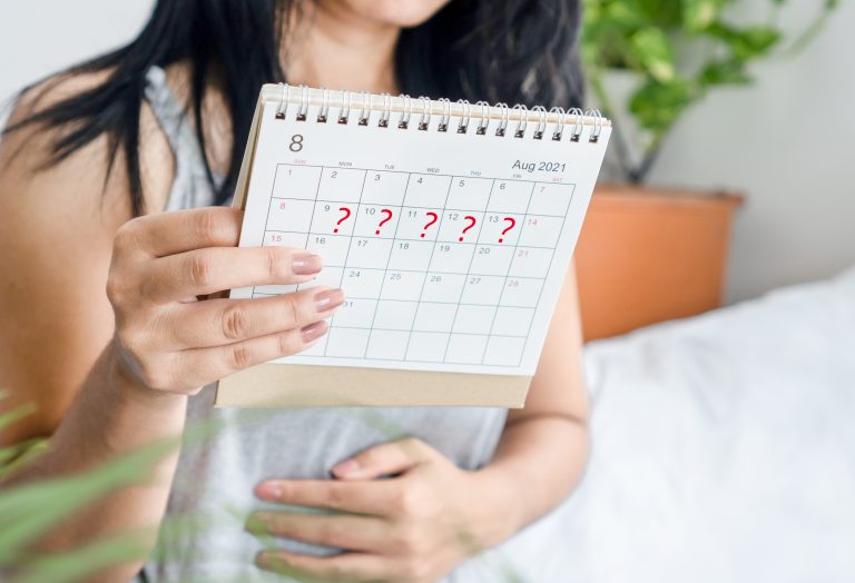 Woman,Hand,Holding,Calendar,With,Question,Mark,Waiting,For,Late