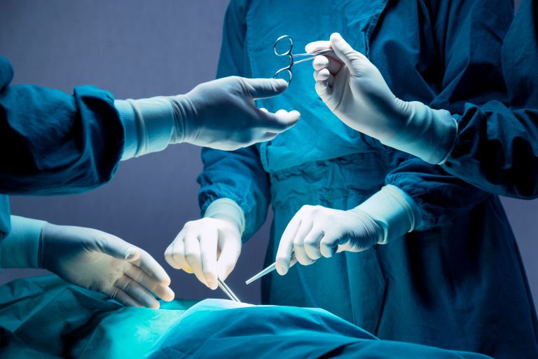 Doctor,And,Nurse,Medical,Team,Are,Performing,Surgical,Operation,At