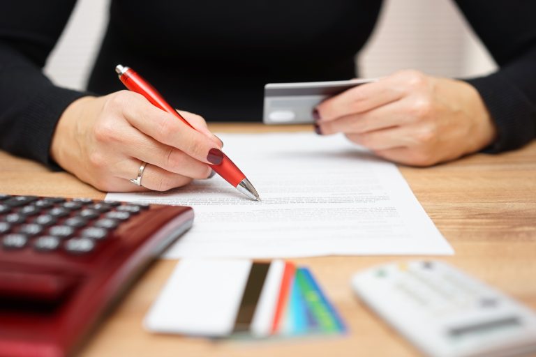 Woman,Is,Opening,Bank,Account,And,Checking,Credit,Card,Information