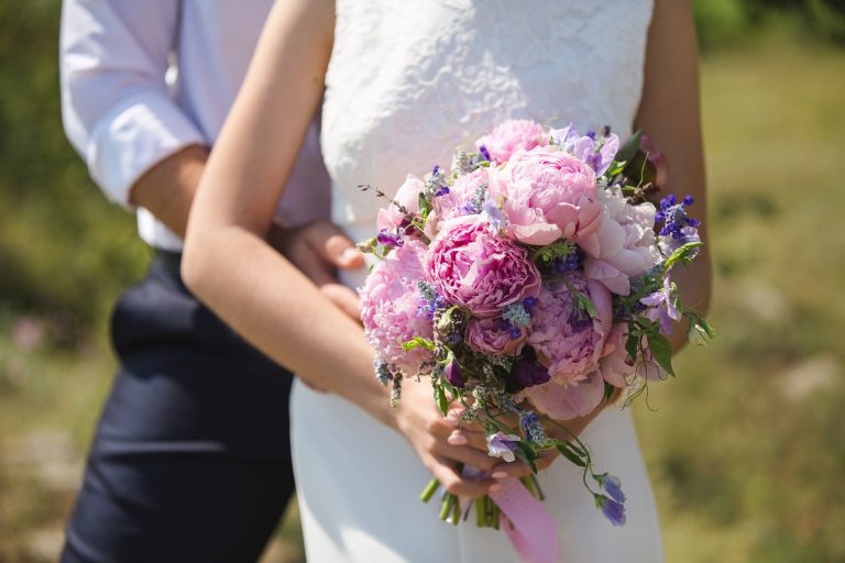 Bride,And,Groom,On,The,Beach