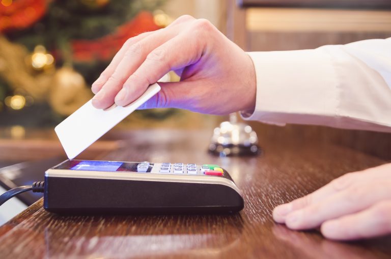Caucasian,Male,In,White,Shirt,Paying,Bill,With,Contactless,Credit