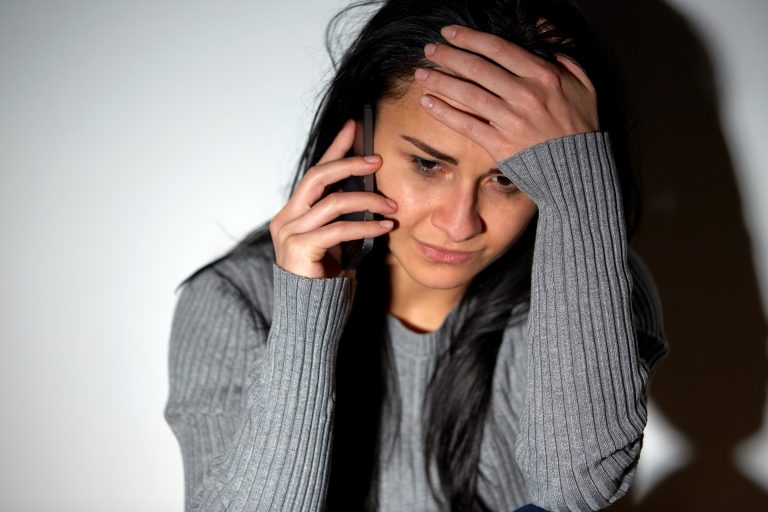 People,,Helpline,And,Domestic,Violence,Concept,-,Close,Up,Of