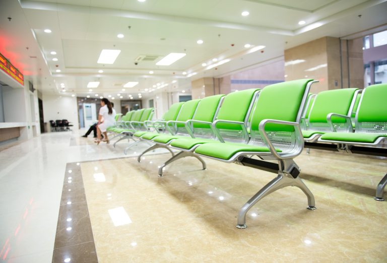 Hospital,Waiting,Room,With,Empty,Chairs.
