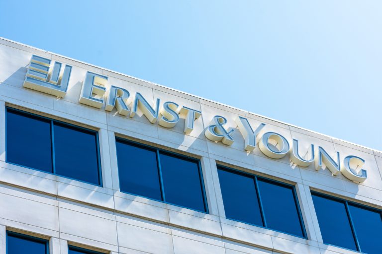 Ernst,And,Young,Logo,Atop,Of,A,Multinational,Professional,Services