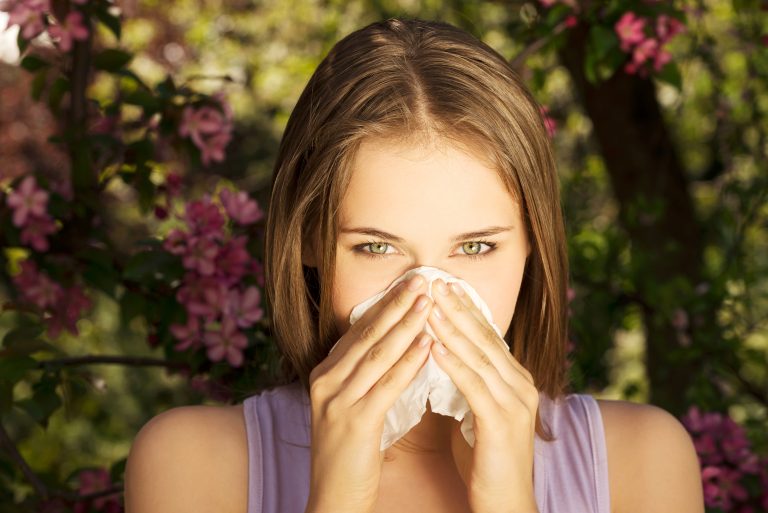 Young,Woman,With,Allergy,During,Sunny,Day,Is,Wiping,Her