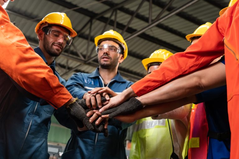 Skillful,Worker,Stand,Together,Showing,Teamwork,In,The,Factory,.