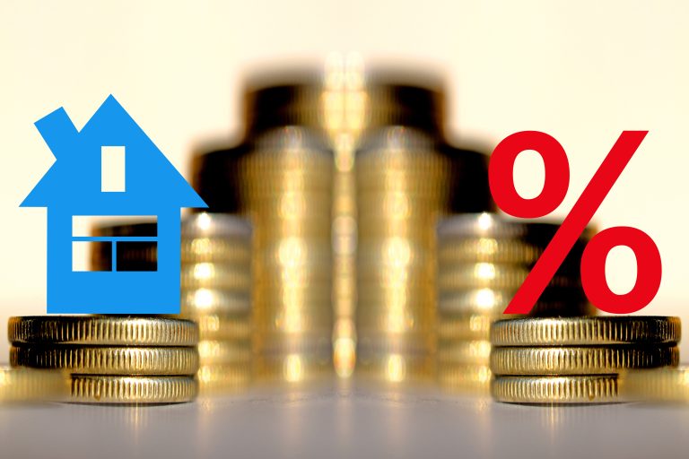The,Percent,Symbol,And,Real,Estate,On,A,Background,Of