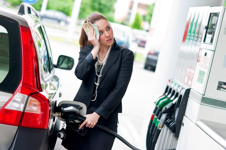 Woman,With,Money,In,Her,Hand,Refuel,Car,In,Gas