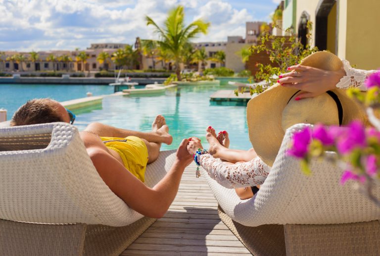 Couple,On,Vacation,In,Luxury,Resort