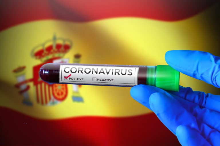 Scientist,Holding,Coronavirus,Positive,Blood,Test,Tube,In,Front,Of