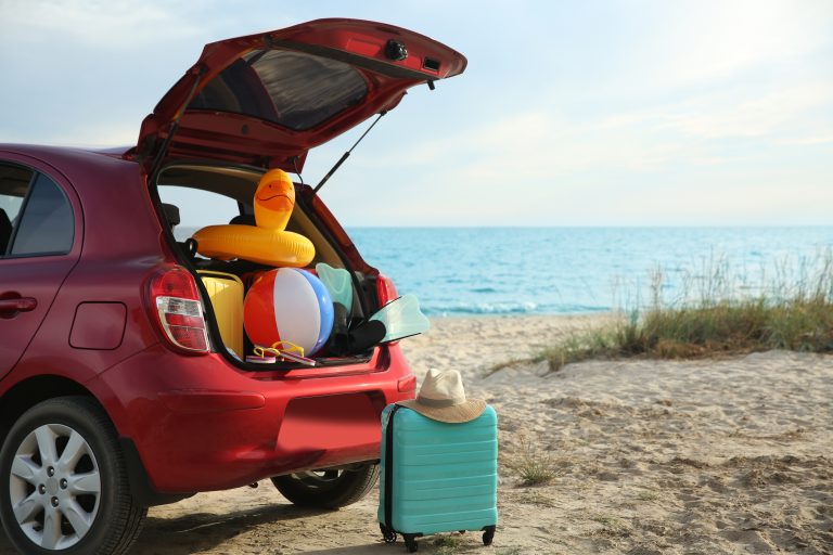 Red,Car,Luggage,On,Beach,,Space,For,Text.,Summer,Vacation