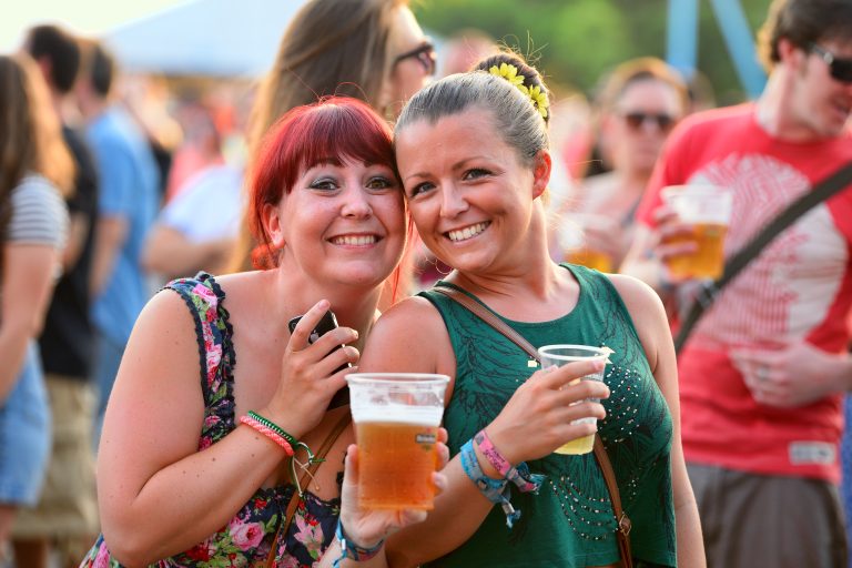 Benicassim,,Spain,-,July,17:,People,Have,Fun,Drinking,Beer