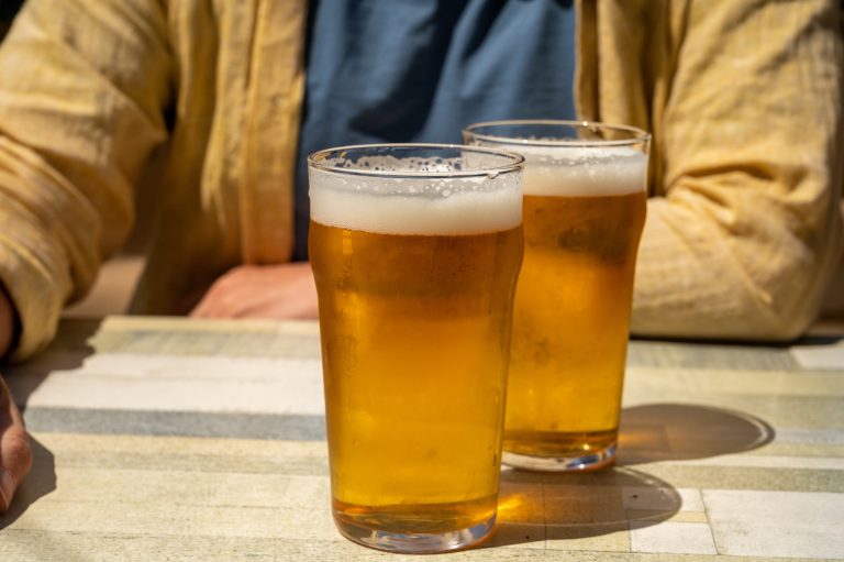 Men,With,Two,Glasses,Of,Fresh,Cold,Lager,Beer,In