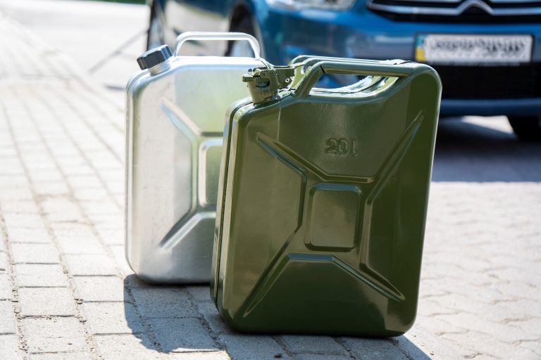 Gas,Tanks,Or,Canister,Near,The,Car.,Fuel,Reserve,Replenishment