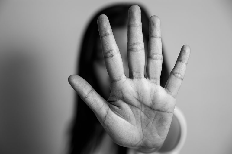 Woman,Raised,Her,Hand,For,Dissuade,,Campaign,Stop,Violence,Against