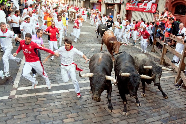 Pamplona,,Spain,-july,14:,Unidentified,Men,Run,From,Bulls,In