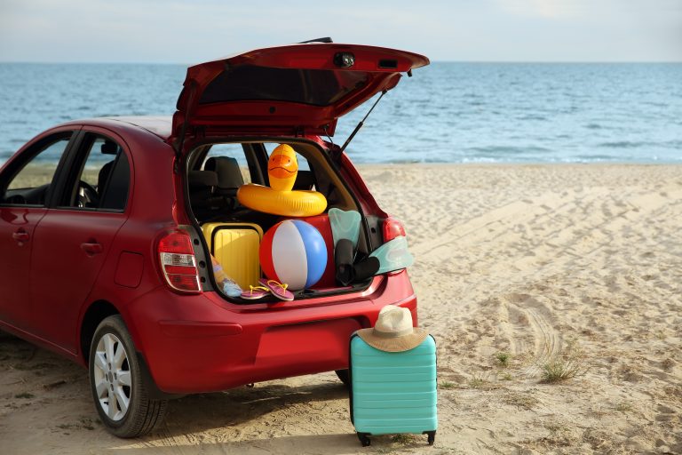 Red,Car,Luggage,On,Beach,,Space,For,Text.,Summer,Vacation