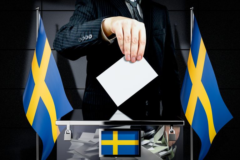 Sweden,Flags,,Hand,Dropping,Voting,Card,-,Election,Concept,-