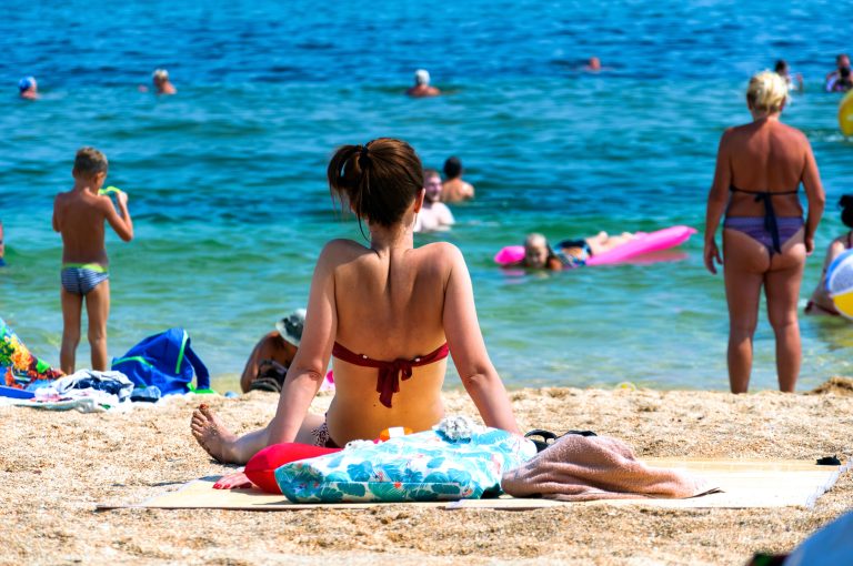 August,24,,2021,Republic,Of,Crimea,Feodosiya.,People,Sunbathe,On