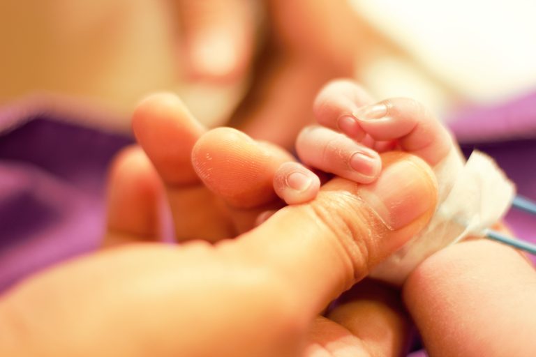 Selective,Focus,On,Sick,Newborn,Hand,Who,Was,Monitored,His/her