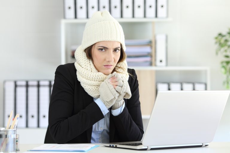 Angry,Businesswoman,Having,Cold,Looking,At,Camera,At,Office
