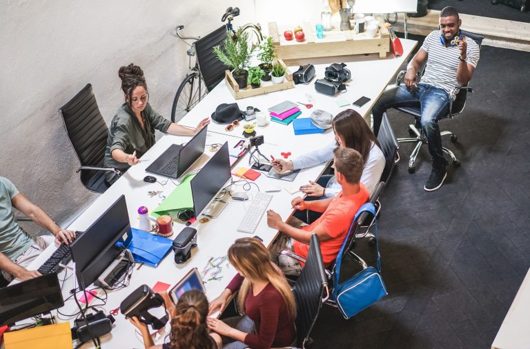 Young,Co-workers,Team,Talking,During,Startup,-,Happy,People,Planning