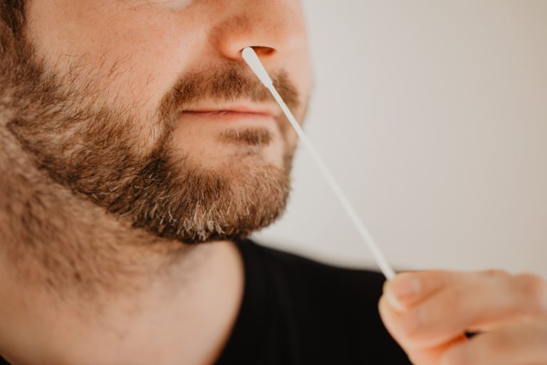 Man,With,Beard,Inserts,Test,Stick,For,Corona,Test,Into