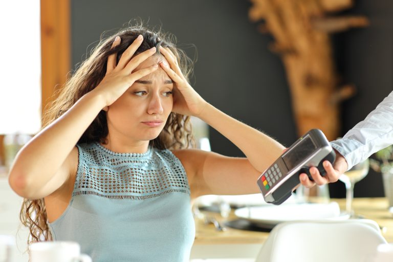 Worried,Woman,Complaining,About,Expensive,Restaurant,Bill