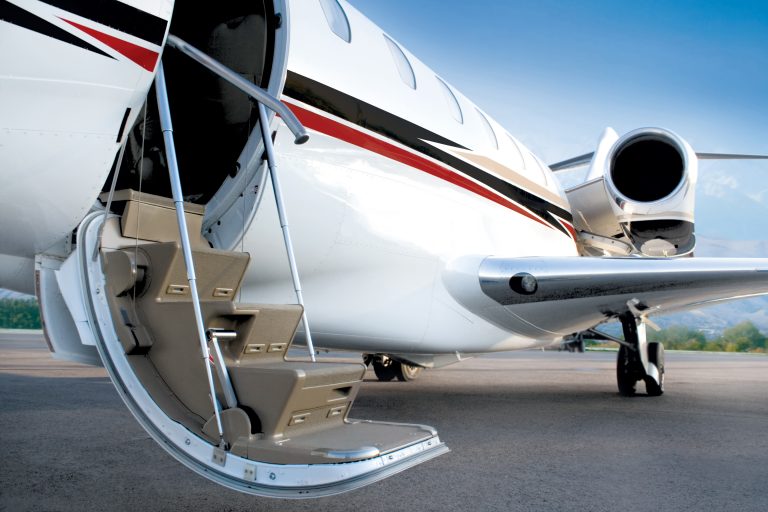 Business,Private,Jet,With,Open,Stairs,Waiting,For,Passenger,,Early