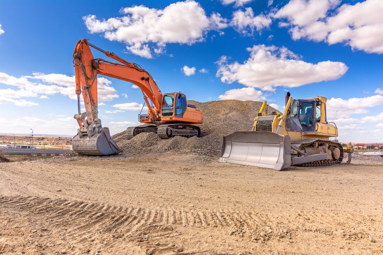 Group,Of,Excavator,Working,On,A,Construction,Site