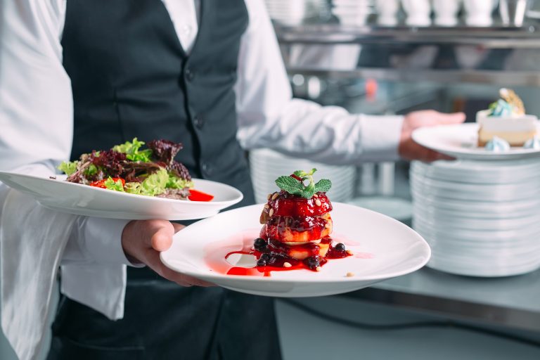 Waiter,Serving,In,Motion,On,Duty,In,Restaurant.,The,Waiter