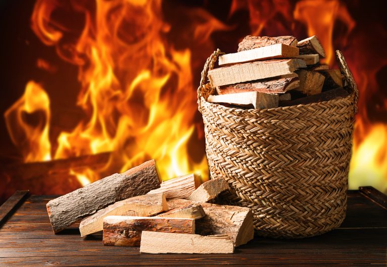 Dry,Wood,And,Burning,Fire,On,Background.,Cozy,Atmosphere