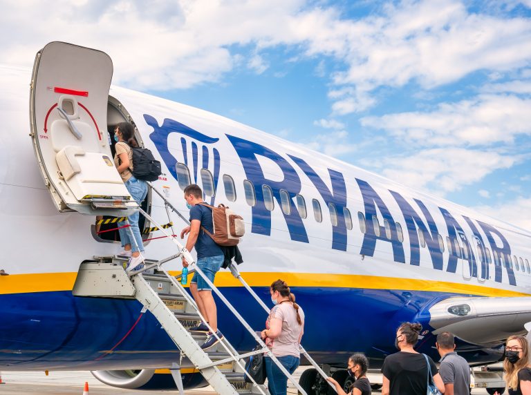 Timisoara,,Romania,-,06.20.2021:,Passengers,Boarding,On,A,Ryanair,Plane